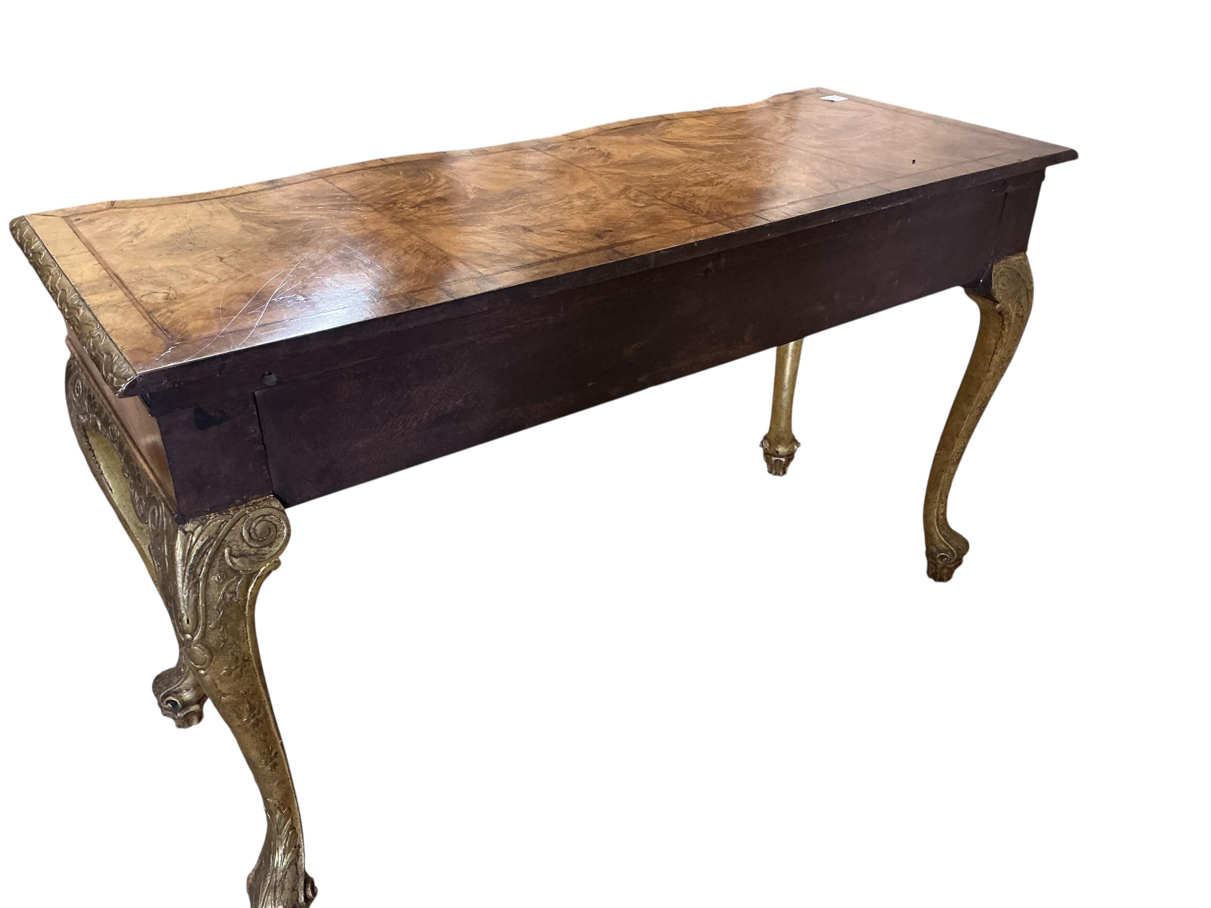 A George I style parcelgilt walnut two drawer serving table, width 137cm, depth 54cm, height 82cm